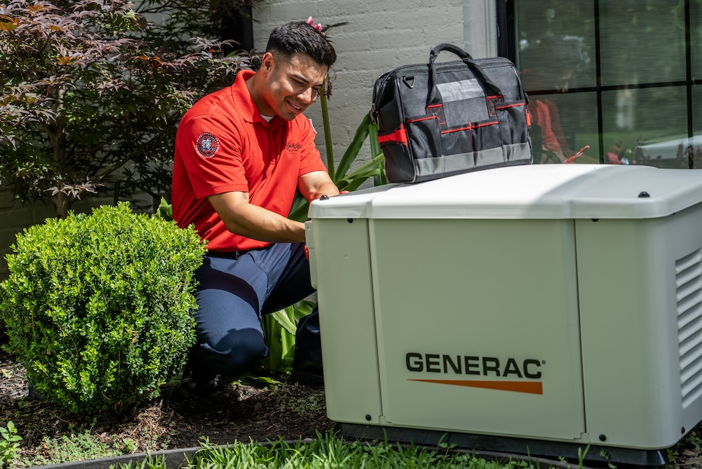 Technician working on generator